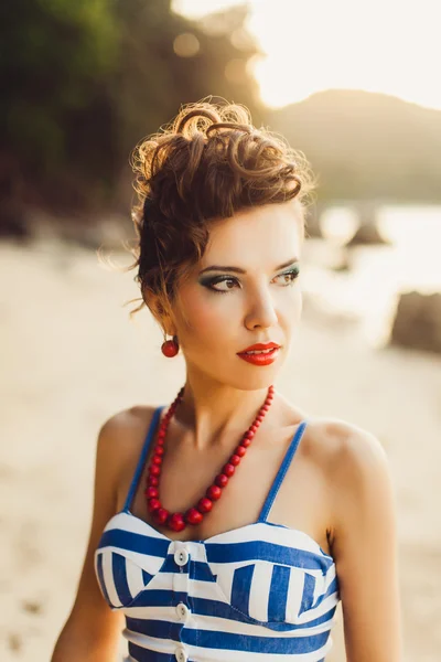 Brunette posing on the beach — Stock Photo, Image