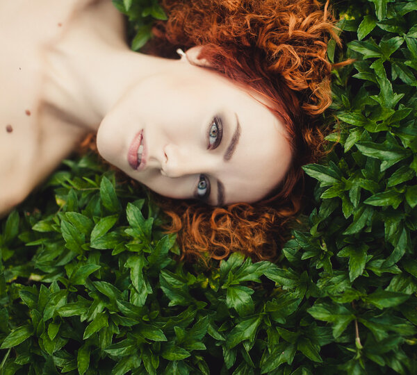young girl posing in forest