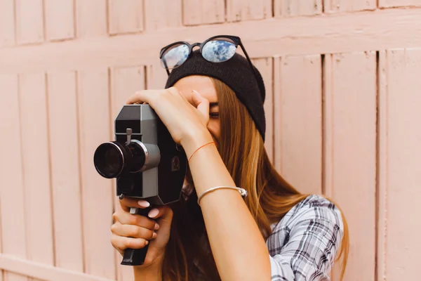 Hipster woman with video camera — Stok fotoğraf