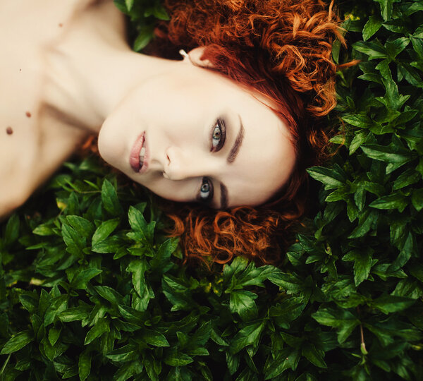 young girl posing in forest