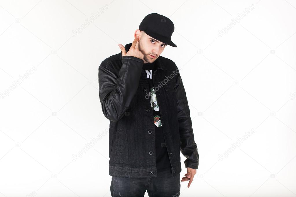 guy in jacket and baseball cap