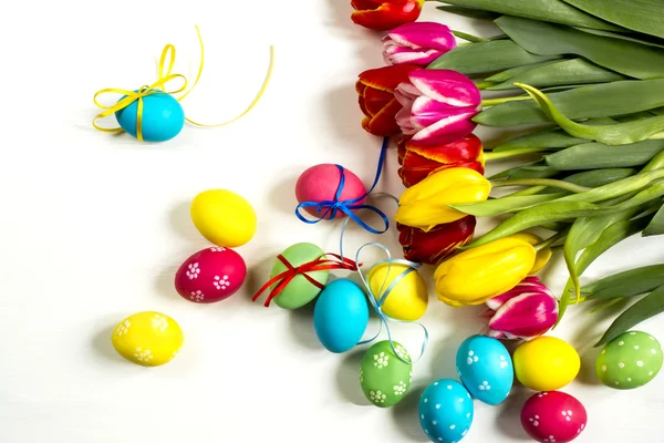 Tulips and Easter eggs not white background — Stock Photo, Image