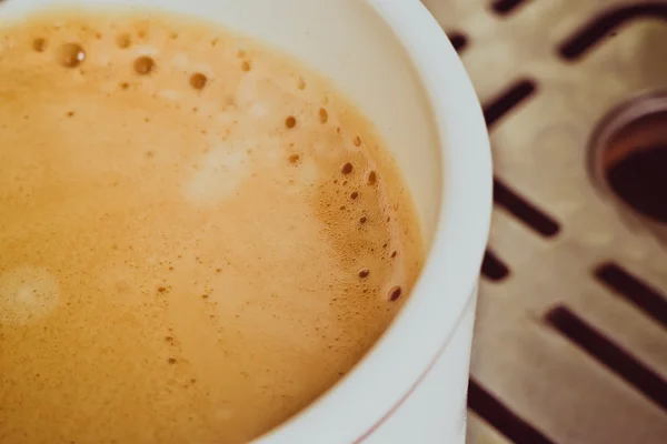 Kopp kaffe med skum makro — Stockfoto