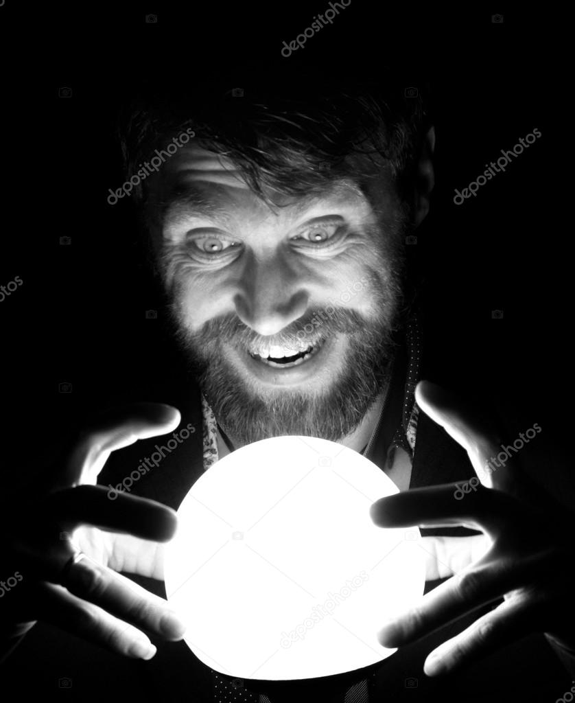 black and white, bearded man in the dark, holding in front of a lamp, expresses different emotions