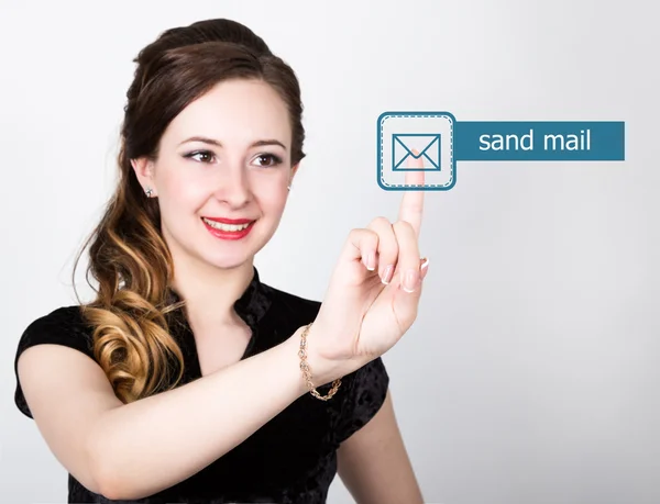 Technology, internet and networking concept. beautiful woman in a black business shirt. woman presses send mail button on virtual screens — Stockfoto