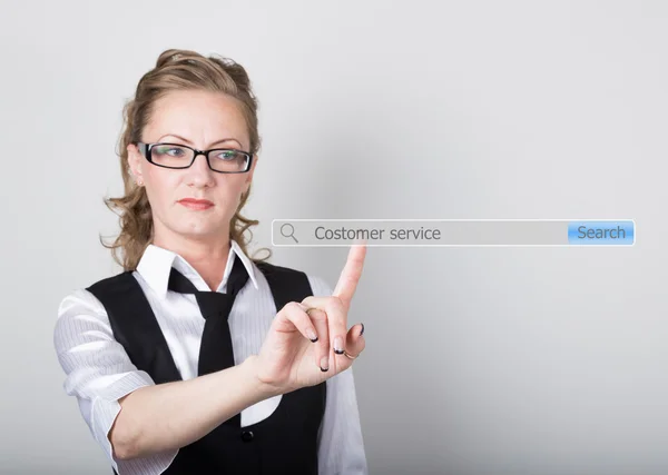 Costomer service written in search bar on virtual screen. Internet technologies in business and home. woman in business suit and tie, presses a finger on a virtual screen — Stock Photo, Image