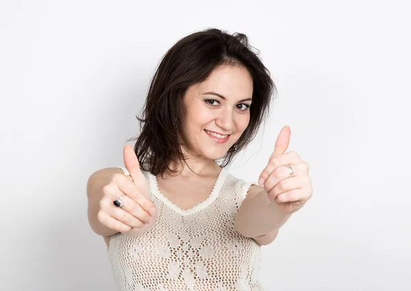 Hermosa joven morena mujer en un vestido de encaje posando y expresa diferentes emociones. las manos de las niñas muestra varios signos. primer plano portret — Foto de Stock