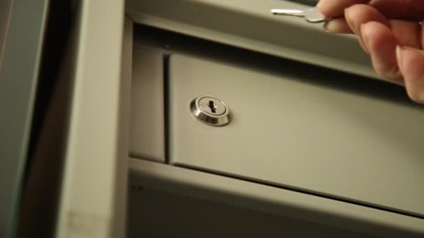 Key unlocked a safe latch and opening door safety deposit box — Stock Video