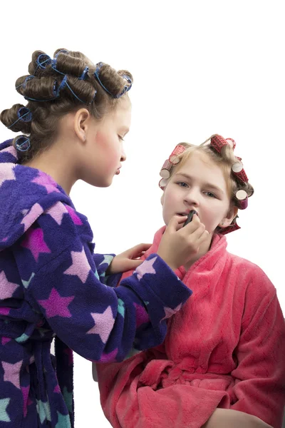 Two teenager girls playing Housewives, do yourself hairstyles and makeup having fun — Stock Photo, Image