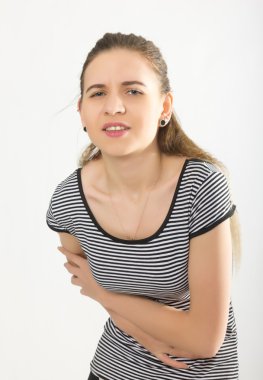 menstruation pain or stomacbeautiful young girl holding her stomach, abdominal pain during the menstrual cycleh ache