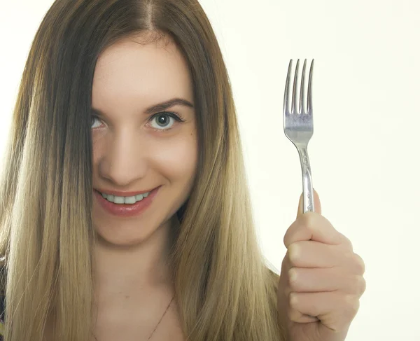 Fotografía de cerca de la mujer con el pelo largo, sus manos sosteniendo tenedor —  Fotos de Stock
