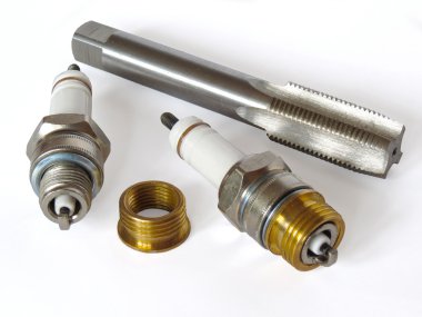 Repair kit to spark plug well clipart