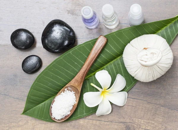 Spa massage compress balls, herbal ball on the leaves with rock spa, Thailand, select focus