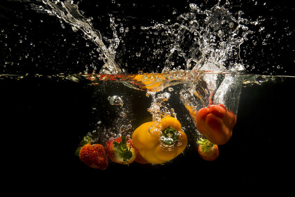 Photo of vegetables dropped under water