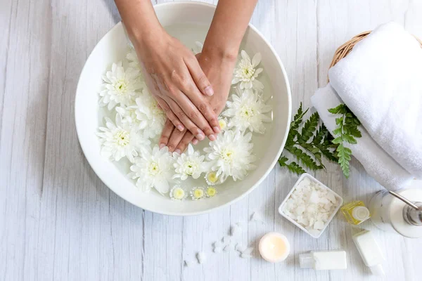 Spa beauty massage health wellness. Spa Thai therapy treatment aromatherapy for nail and hands woman with white flower nature candle for relax and summer time.  Lifestyle and cosmetic Concept