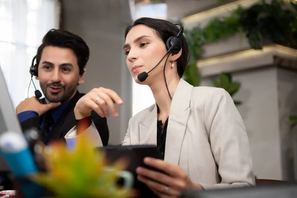 Call center and customer service team support for information operator at work.  People woman employee consultant and talking on hands free phone for help and service customer.