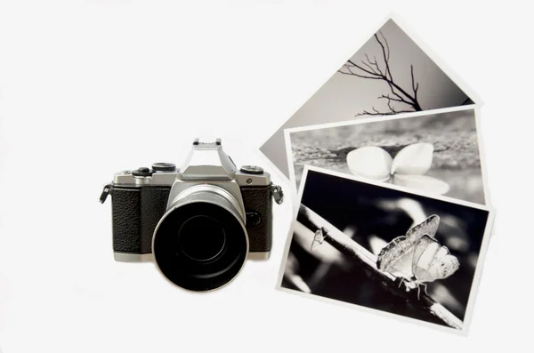 Photo album with photos of travel and vintage old camera on a white background — Stock Photo, Image