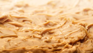 Fıstık ezmesi yayılmış arkaplan - alanın sığ derinliği