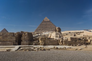 General view of Egyptian pyramids and Sphinx  clipart