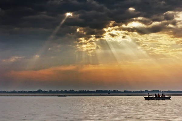 People on boat at evening — Stock Photo, Image