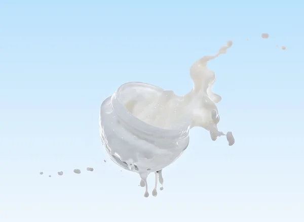Feuchtigkeitscreme, feuchtigkeitsspendende Milch im großen Milchspritzer — Stockfoto
