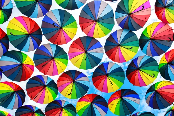 Colorful umbrellas background. Colorful umbrellas in the sky. St — Stock Photo, Image