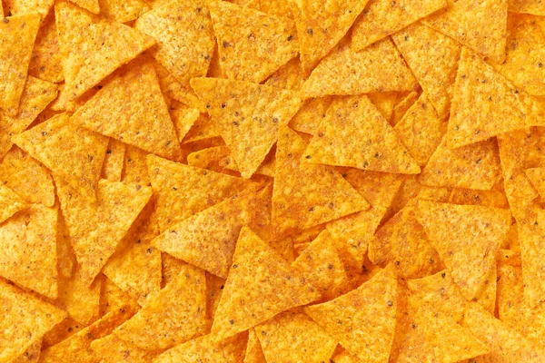 Mısırlı tortilla cipsi ya da nachos, en iyi manzara. Meksika nachos çipleri doku arka planı.