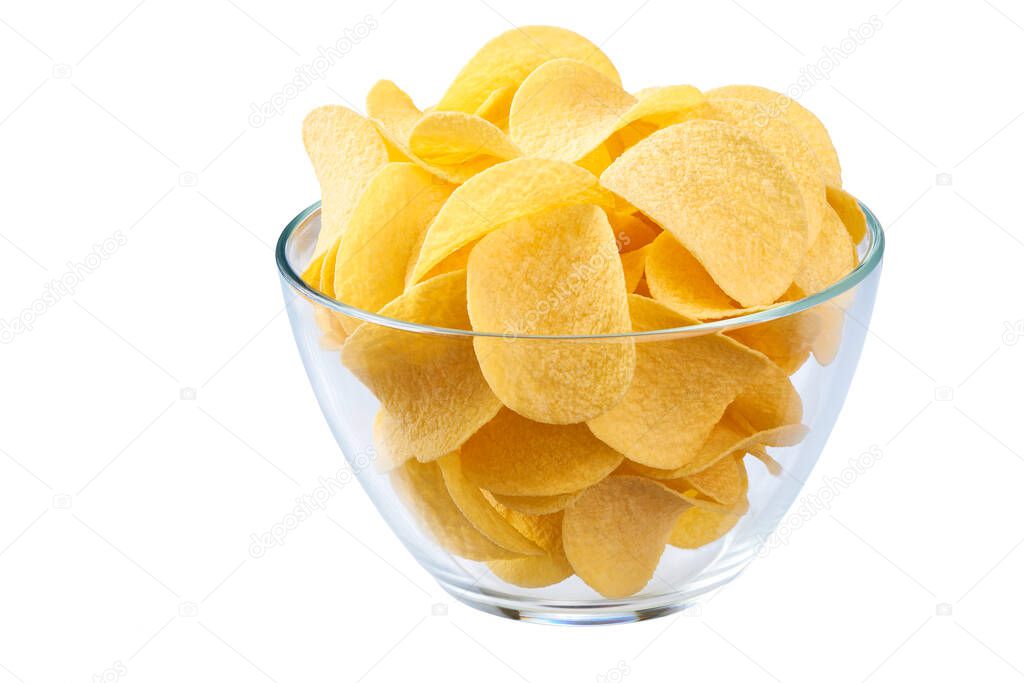 glass bowl of delicious potato chips isolated on a white background.