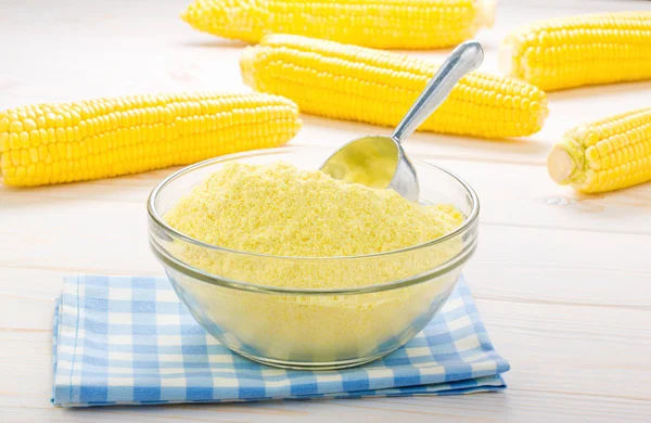 Corn flour on a wooden background — Stock Photo, Image