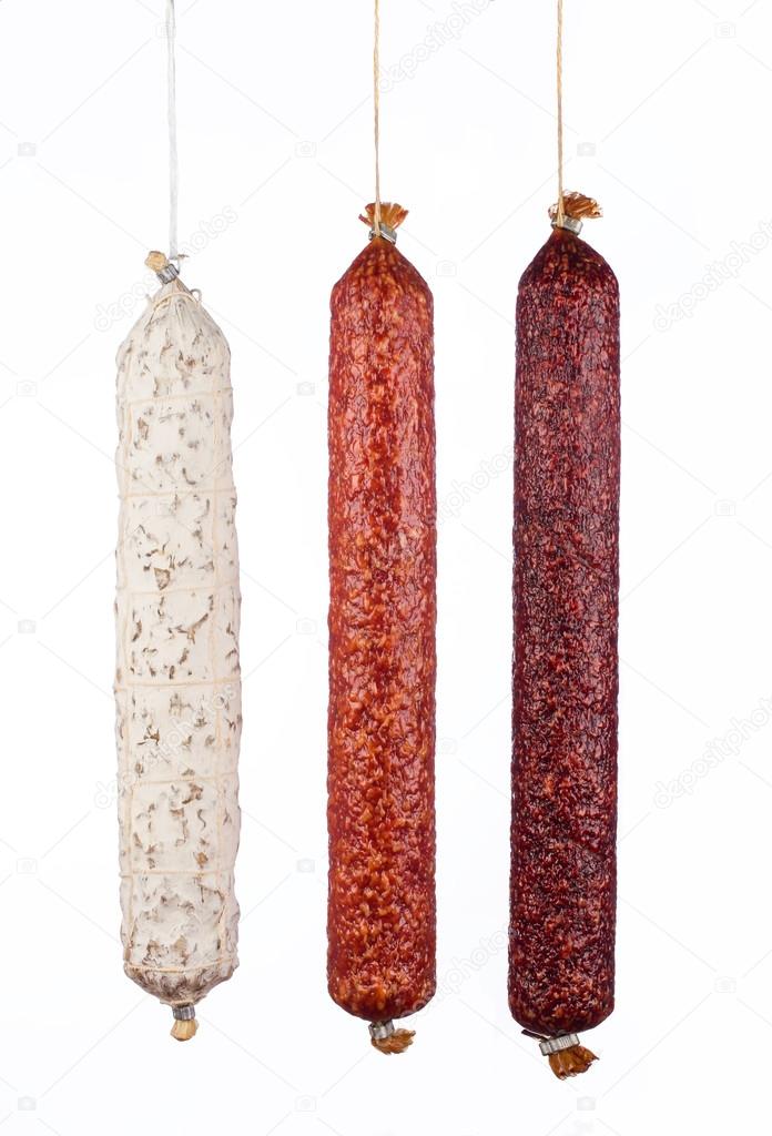 selection salami sausages isolated on white background