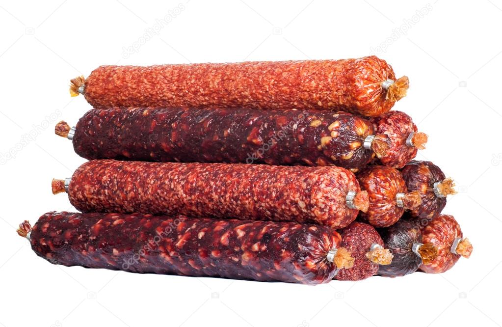 a large assortment of salami isolated