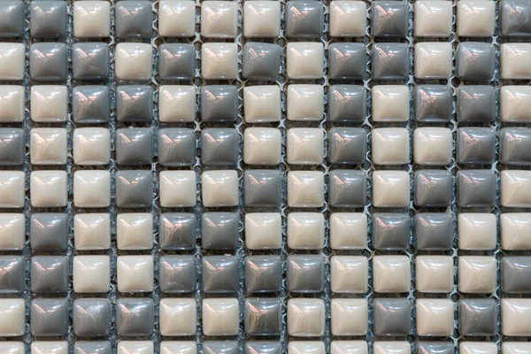 Ceramic mosaic tiles with white and grey embossed squares to decorate the kitchen, bathroom or pool. Mosaic of brown marble in the form of squares — Stock Photo, Image