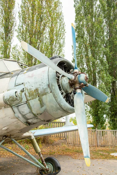 Old aircraft close up. old airplane. vertical photo. toned