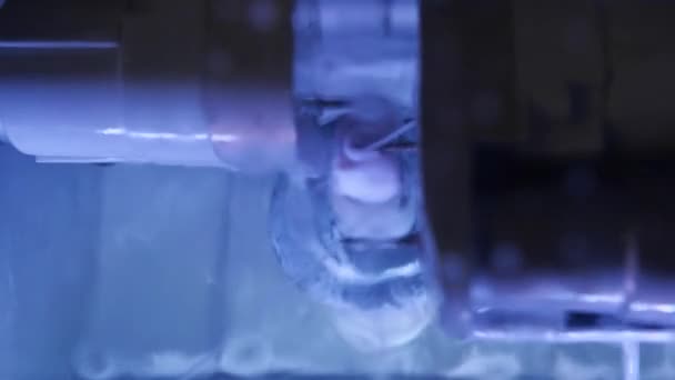 The milling machine makes the shape of a tooth — Stock Video