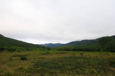 Dağ manzarası, Kamçatka 'da büyüleyici bir yürüyüş, volkanlar diyarında Semenovsky kordonuna yolculuk.
