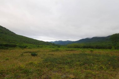 Dağ manzarası, Kamçatka 'da büyüleyici bir yürüyüş, volkanlar diyarında Semenovsky kordonuna yolculuk.