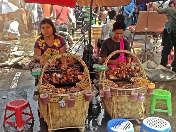 Street food sellers in Yangon, Myanmar. Locals eat pot street food.
