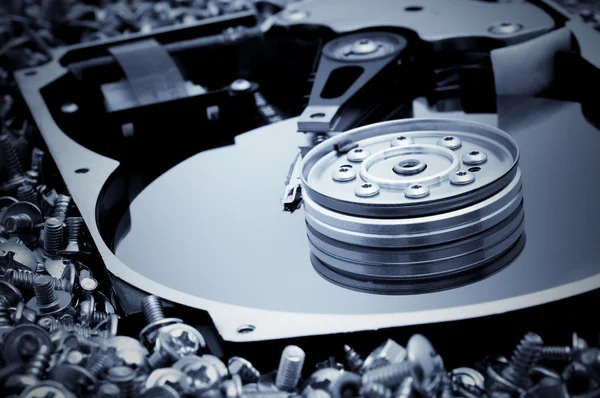 Hard disk detail on bolts background — Stock Photo, Image