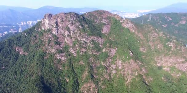 Mountain steep cliff near the city — Stock Video