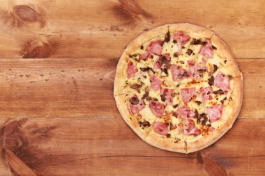 pizza with bacon ham and mushrooms