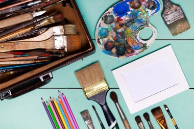 Top view of art workplace