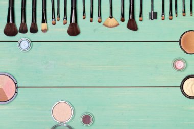 Set of cosmetics on wooden table  clipart