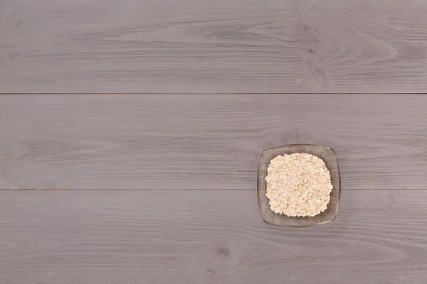 Avena lista para cocinar en tazón — Foto de Stock