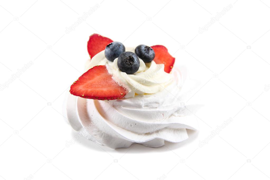 Meringue cake with whipped cream and fresh blueberries