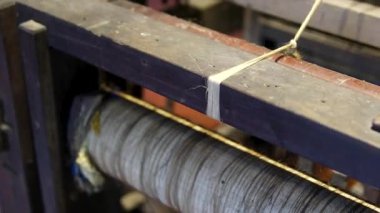 traditional silk production process carefully create silk fabric from start to finish. From spinning fine silk threads to weaving on wooden looms, this handmade craft reflects cultural heritage, skill