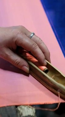 traditional silk production process carefully create silk fabric from start to finish. From spinning fine silk threads to weaving on wooden looms, this handmade craft reflects cultural heritage, skill