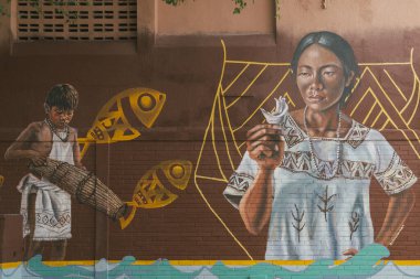 Barranquilla, Atlantico, Kolombiya. 15 Şubat 2026: Barrio Abajo 'da mavi gökyüzü olan güzel sanatsal resimler.