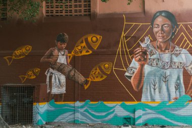 Barranquilla, Atlantico, Kolombiya. 15 Şubat 2026: Barrio Abajo 'da mavi gökyüzü olan güzel sanatsal resimler.