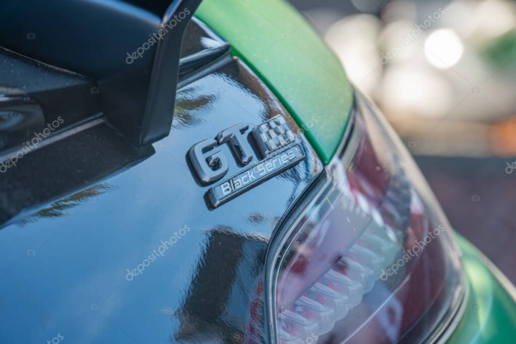 Close-up side view of a black and green Mercedes GT3 sports car, with GT3 logo visible Daytime setting Kyiv, Ukraine - September 21, 2025