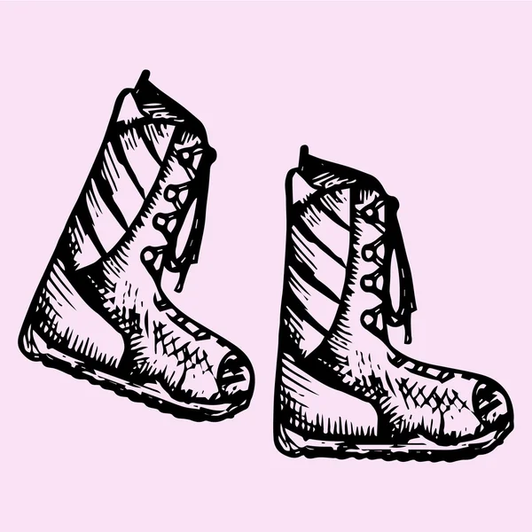 Winter boots, doodle style — Stock Vector